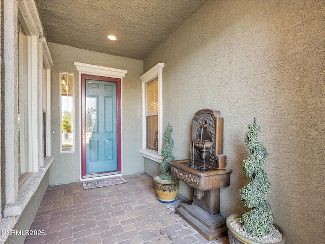 1486 Lambrays Ct, Sparks, NV 89436 - entrance to property with stucco siding and covered porch