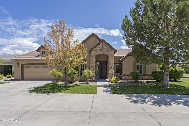 590 S Sand Crane Cir, Sparks, NV 89436 - french provincial home featuring stone siding, driveway, stucco siding, and a garage