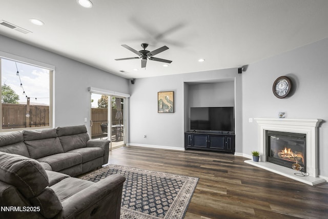 590 S Sand Crane Cir, Sparks, NV 89436 - living room with dark wood finished floors, a ceiling fan, recessed lighting, and a glass covered fireplace