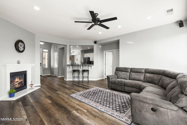 590 S Sand Crane Cir, Sparks, NV 89436 - living area featuring ceiling fan, dark wood-style flooring, recessed lighting, and a glass covered fireplace