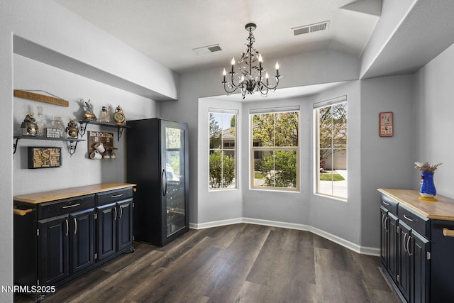 590 S Sand Crane Cir, Sparks, NV 89436 - dining space featuring a chandelier and dark wood-type flooring