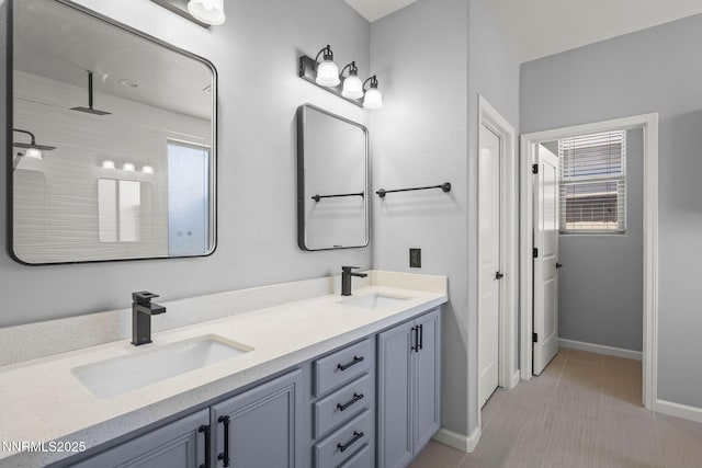 590 S Sand Crane Cir, Sparks, NV 89436 - bathroom featuring double vanity, tile patterned flooring, and a shower
