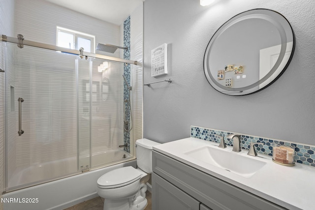 590 S Sand Crane Cir, Sparks, NV 89436 - bathroom with vanity, combined bath / shower with glass door, backsplash, and tile patterned floors