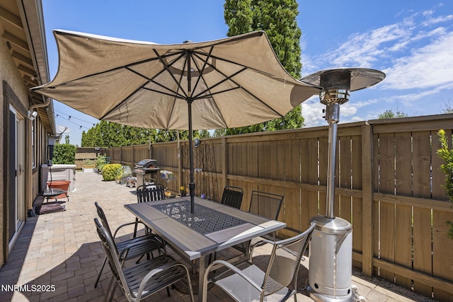 590 S Sand Crane Cir, Sparks, NV 89436 - fenced backyard with a patio, outdoor dining area, and area for grilling