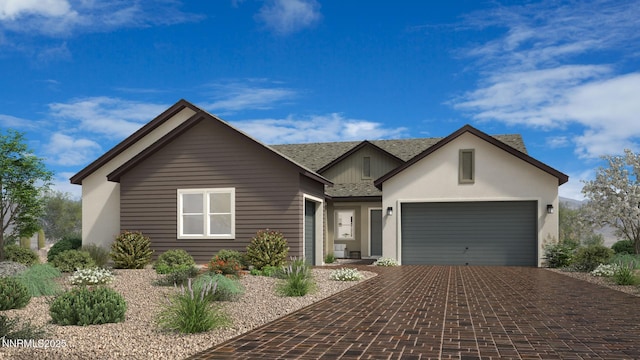 2940 Murrelet Way Unit Cinmon 83, Sparks, NV 89441 - view of front of home with decorative driveway, an attached garage, and a shingled roof
