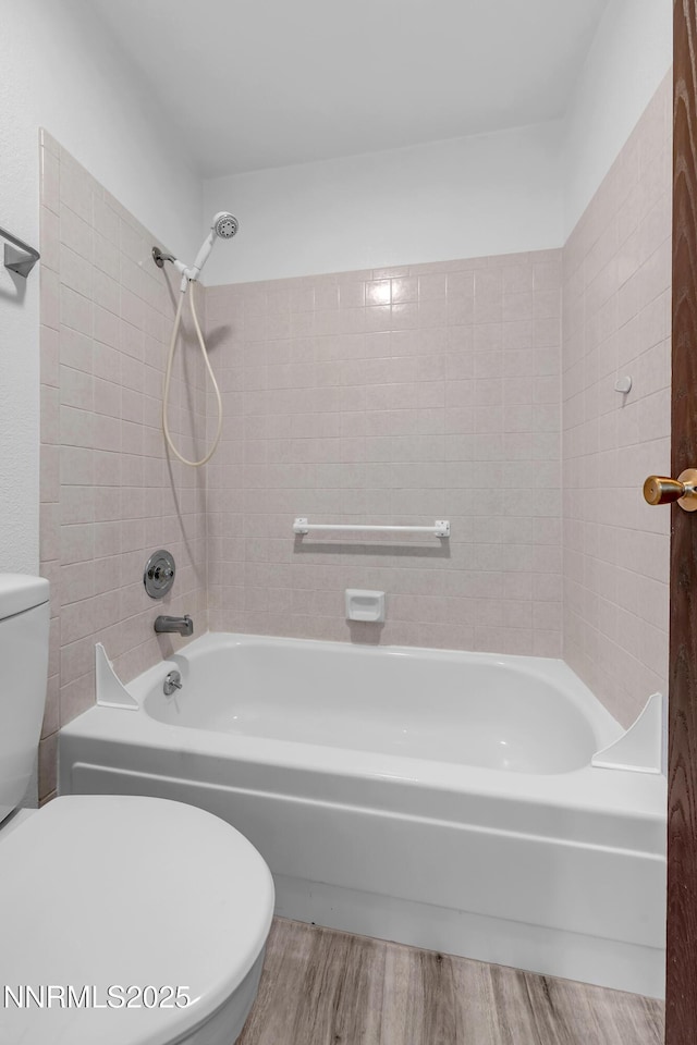 2450 Lymbery St Unit 331, Reno, NV 89509 - bathroom featuring wood finished floors and tub / shower combination