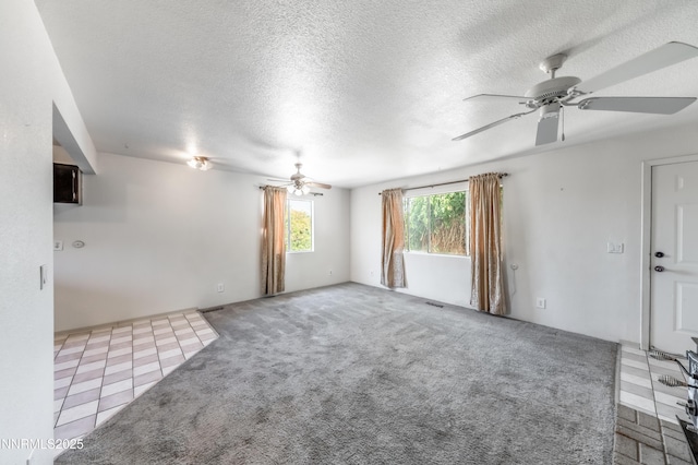 8720 Aquifer Way, Reno, NV 89506 - empty room with ceiling fan and a textured ceiling