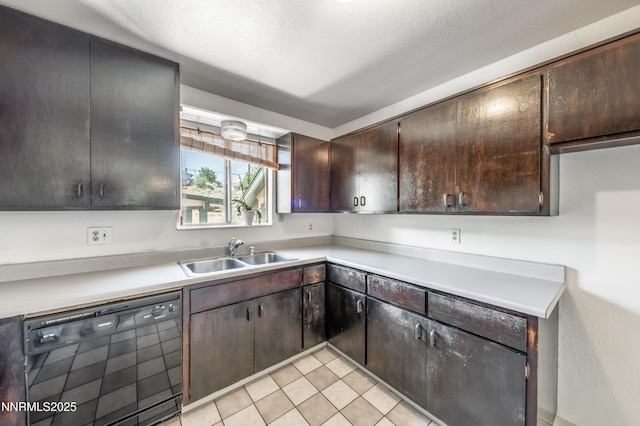 8720 Aquifer Way, Reno, NV 89506 - kitchen featuring dishwasher, light countertops, and dark brown cabinetry
