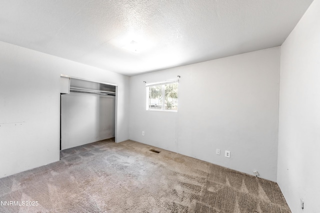 8720 Aquifer Way, Reno, NV 89506 - unfurnished bedroom featuring carpet floors and a closet