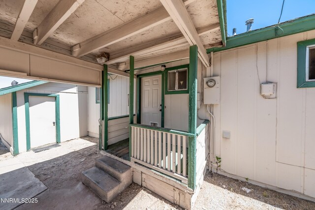 8720 Aquifer Way, Reno, NV 89506 - entrance to property with board and batten siding