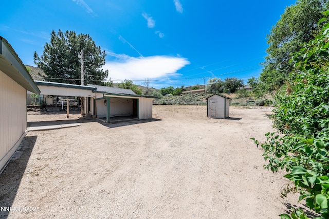 8720 Aquifer Way, Reno, NV 89506 - view of yard with an outbuilding