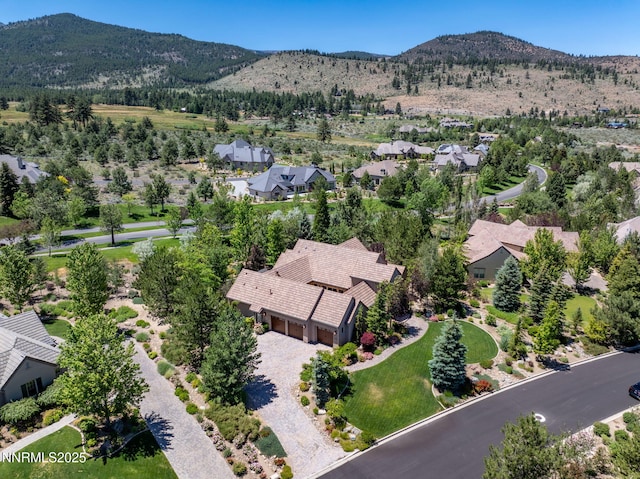 16956 Rue Du Parc Ave, Reno, NV 89511 - aerial view of property's location featuring a mountainous background and nearby suburban area