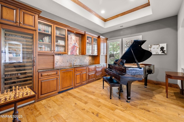 16956 Rue Du Parc Ave, Reno, NV 89511 - sitting room with a tray ceiling, ornamental molding, light wood-style flooring, and recessed lighting