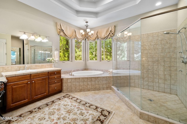 16956 Rue Du Parc Ave, Reno, NV 89511 - bathroom with tile patterned flooring, vanity, a shower stall, a bath, and a chandelier