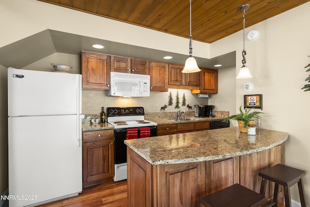 123 Juanita Dr Unit 1-7, Incline Village, NV 89451 - kitchen featuring white appliances, wood ceiling, wood finished floors, brown cabinetry, and recessed lighting