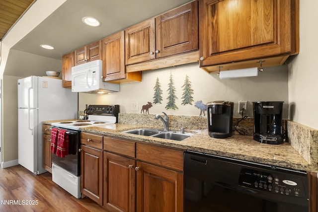 123 Juanita Dr Unit 1-7, Incline Village, NV 89451 - kitchen with white appliances, dark wood-type flooring, brown cabinetry, light stone countertops, and recessed lighting