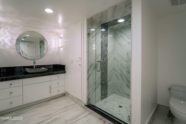 275 Chukkar Dr, Glenbrook, NV 89413 - full bath with marble look tile flooring, recessed lighting, vanity, and a marble finish shower