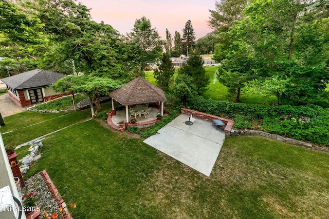 171 Mill St, Genoa, NV 89411 - view of green lawn with a gazebo, an outbuilding, a patio area, and french doors