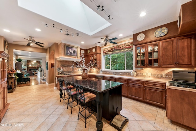 171 Mill St, Genoa, NV 89411 - kitchen featuring ceiling fan, backsplash, light tile patterned floors, recessed lighting, and ornamental molding