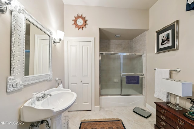 171 Mill St, Genoa, NV 89411 - bathroom with shower / bath combination with glass door, tile patterned floors, and a closet