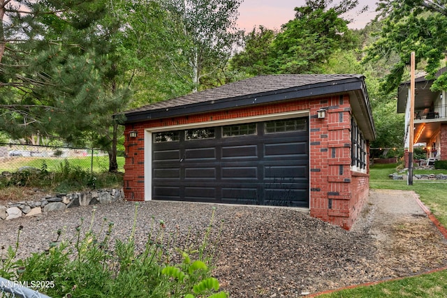 171 Mill St, Genoa, NV 89411 - garage at dusk with a detached garage