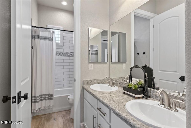 10 Diamond Strm Ct, Sparks, NV 89441 - full bath featuring double vanity, a textured wall, wood finished floors, and shower / bathtub combination with curtain