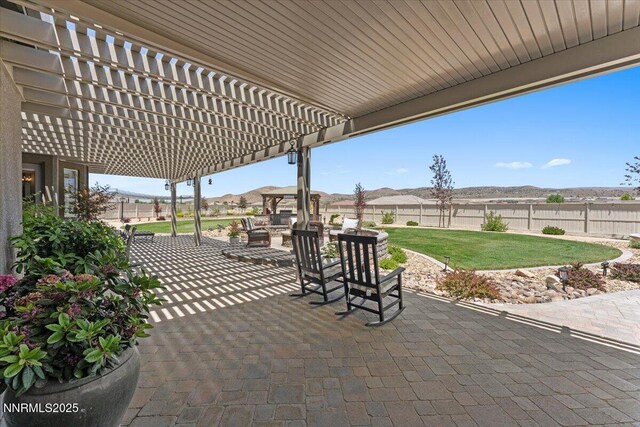 10 Diamond Strm Ct, Sparks, NV 89441 - fenced backyard featuring a pergola, a patio area, and an outdoor hangout area