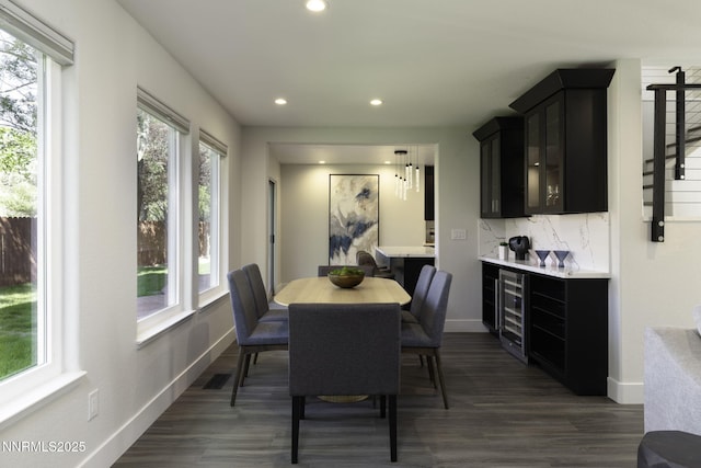 3323 Deer Ridge Ct, Reno, NV 89509 - dining space featuring wine cooler, plenty of natural light, recessed lighting, and dark wood-style floors