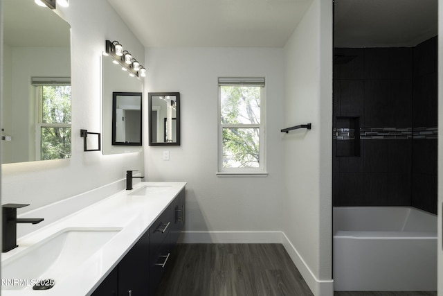 3323 Deer Ridge Ct, Reno, NV 89509 - full bathroom with wood finished floors, double vanity, healthy amount of natural light, and shower / tub combination