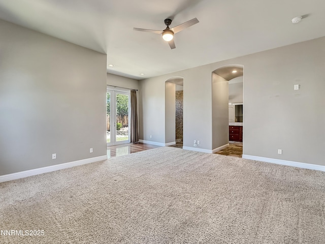 6348 Chilhowee Ct, Sparks, NV 89436 - carpeted spare room featuring arched walkways, a ceiling fan, recessed lighting, and a smoke detector