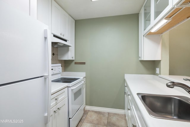 807 Alder Ave Unit 61, Incline Village, NV 89451 - kitchen featuring white appliances, under cabinet range hood, white cabinets, and light countertops