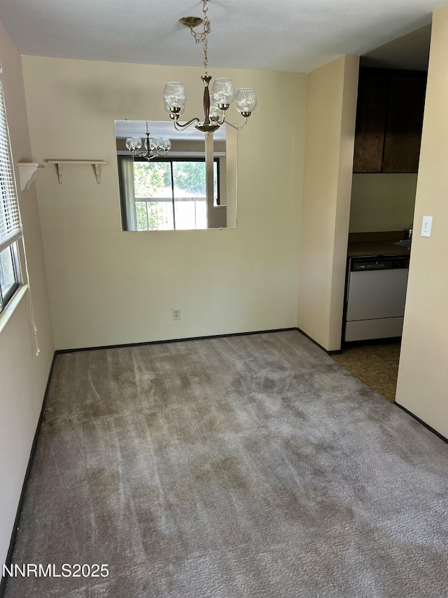 1000 Beck St Unit 361, Reno, NV 89509 - empty room with a chandelier and carpet flooring