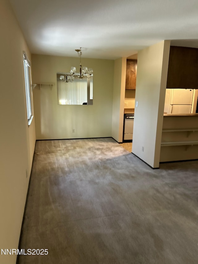 1000 Beck St Unit 361, Reno, NV 89509 - spare room with a chandelier and carpet