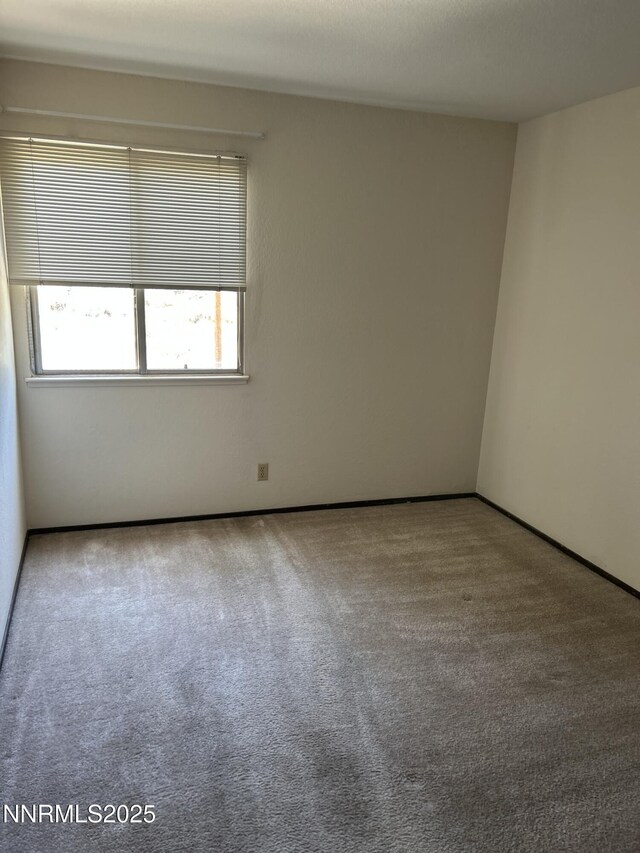 1000 Beck St Unit 361, Reno, NV 89509 - carpeted empty room featuring baseboards
