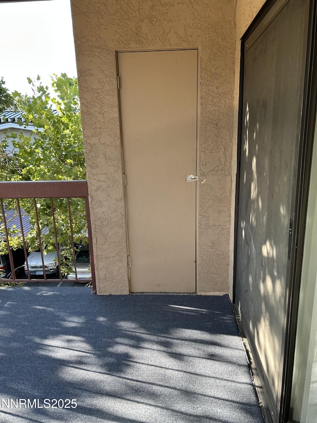 1000 Beck St Unit 361, Reno, NV 89509 - entrance to property featuring a balcony and stucco siding