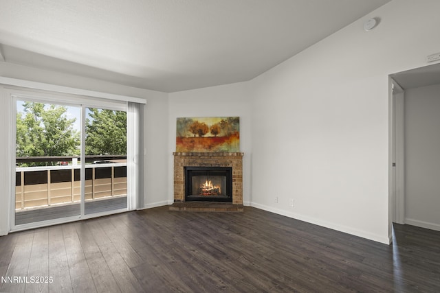 555 E Patriot Blvd Unit 218, Reno, NV 89511 - unfurnished living room with dark wood-style flooring and a fireplace
