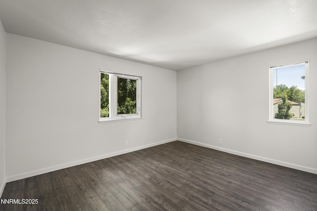 555 E Patriot Blvd Unit 218, Reno, NV 89511 - unfurnished room with dark wood finished floors