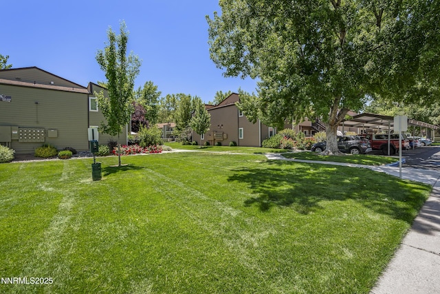 555 E Patriot Blvd Unit 218, Reno, NV 89511 - view of grassy yard featuring mail area and a residential view