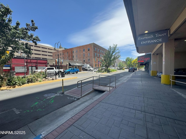 200 W 2nd St Unit 1107, Reno, NV 89501 - view of asphalt road featuring street lighting, curbs, and sidewalks