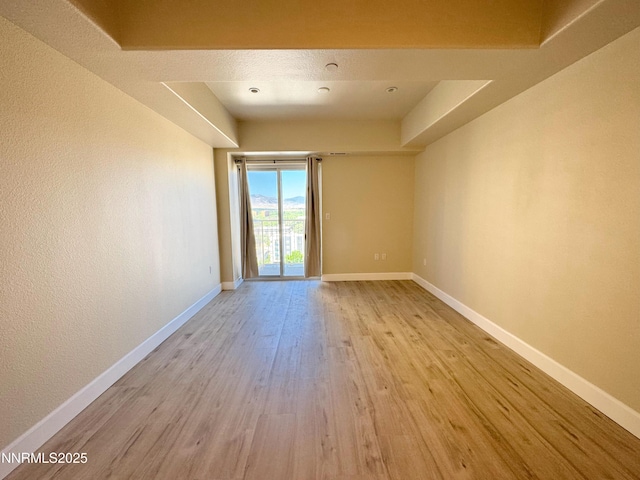 200 W 2nd St Unit 1107, Reno, NV 89501 - empty room featuring wood finished floors and baseboards