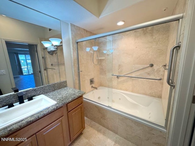 200 W 2nd St Unit 1107, Reno, NV 89501 - bathroom featuring a combined bath / shower with jetted tub and vanity