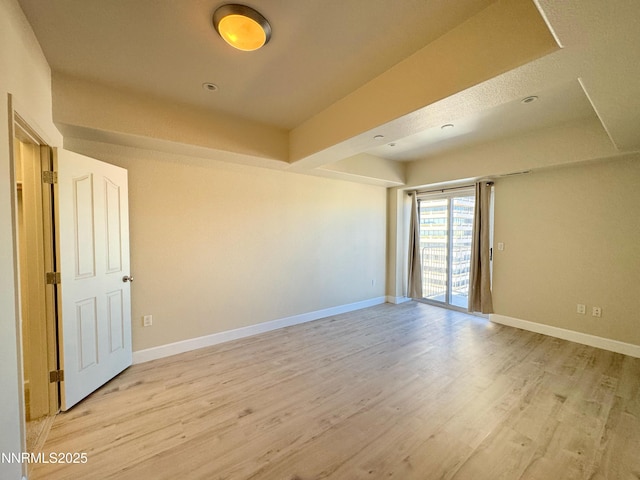 200 W 2nd St Unit 1107, Reno, NV 89501 - unfurnished room featuring light wood-style floors and recessed lighting