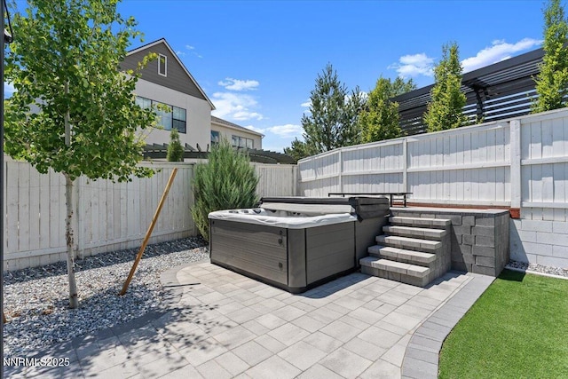 206 Criollo Ct, Reno, NV 89511 - fenced backyard featuring a hot tub and a patio