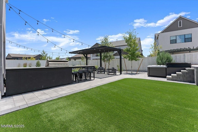 206 Criollo Ct, Reno, NV 89511 - fenced backyard featuring a patio area and a hot tub