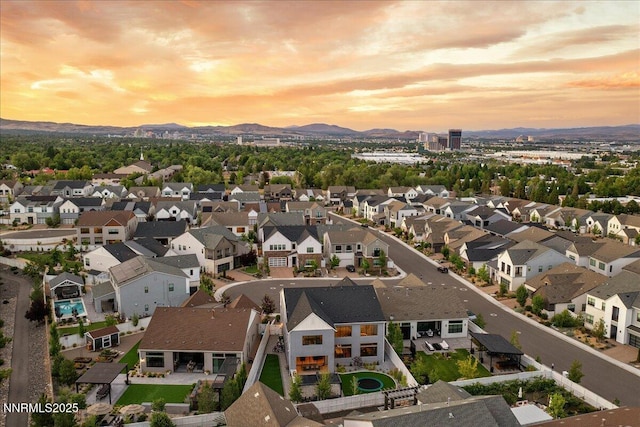 206 Criollo Ct, Reno, NV 89511 - aerial view at dusk of a mountain view and a residential view