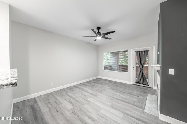 900 S Meadows Pkwy Apt 322, Reno, NV 89521 - empty room with wood finished floors and a ceiling fan
