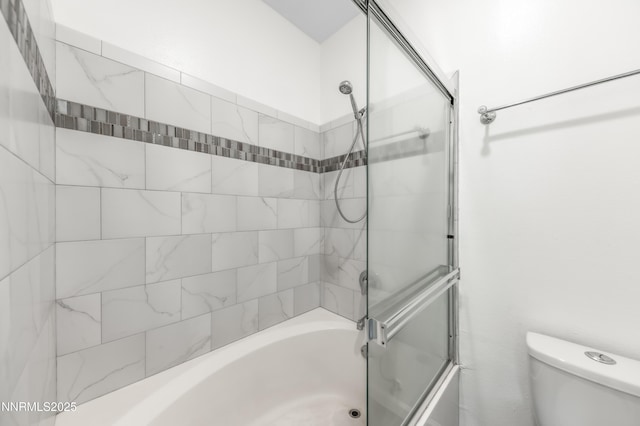 900 S Meadows Pkwy Apt 322, Reno, NV 89521 - bathroom with combined bath / shower with glass door and toilet