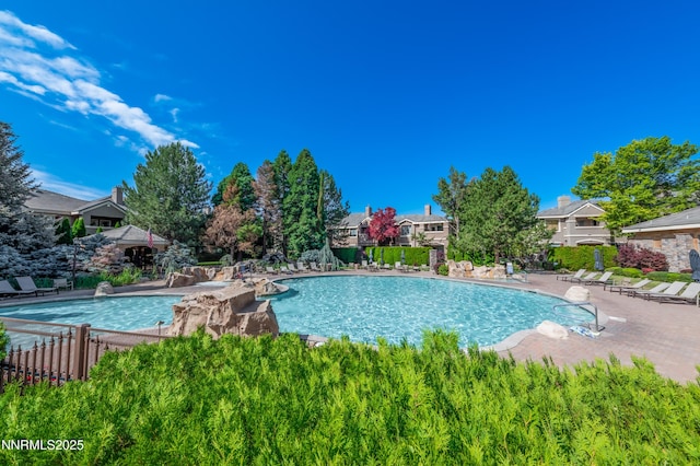 900 S Meadows Pkwy Apt 322, Reno, NV 89521 - community pool featuring a patio