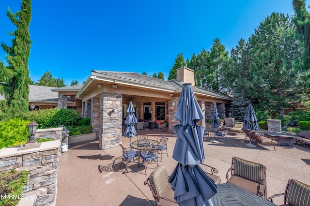900 S Meadows Pkwy Apt 322, Reno, NV 89521 - view of patio / terrace featuring outdoor dining space