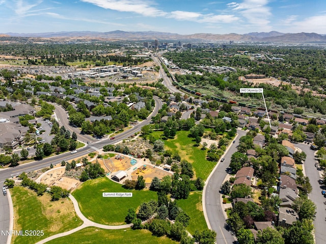 940 Skyway Dr, Reno, NV 89523 - aerial view of property and surrounding area with a mountainous background